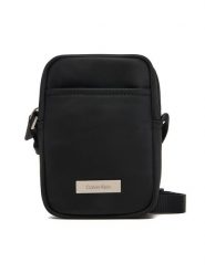 Calvin Klein Saszetka Sleek Slim Reporter LV04D3233G Czarny. Czarne saszetki i nerki CALVIN KLEIN, bez wzorów, z materiału, bez dodatków. Za 289.99 zł.