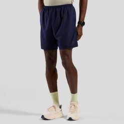 Spodenki męskie Odlo ESSENTIAL 6 INCH Short. Niebieskie szorty ODLO, m, bez wzorów. Za 179.99 zł.