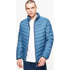 Pikowana kurtka z kontrastową podszewką - Niebieski. Kurtki marki B'TWIN. Za 129.99 zł.