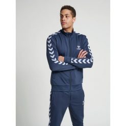 Kurtka Hummel Nathan 2.0 zip. Niebieskie kurtki Hummel, s, bez wzorów, z poliesteru, bez kaptura. Za 289.05 zł.
