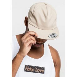 Czapka Flexfit untructured 5-panel. Zielone czapki z daszkiem FLEXFIT, bez wzorów. Za 68.15 zł.
