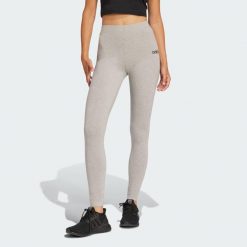 Legginsy Essentials Linear Cotton. Białe legginsy długie sportowe Adidas, uniwersalny, bez wzorów, z bawełny. Za 119.00 zł.