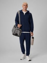 4F Spodnie dresowe joggery męskie - granatowe L. Niebieskie joggery i bojówki 4F, l, bez wzorów, z dresówki. Za 149.99 zł.