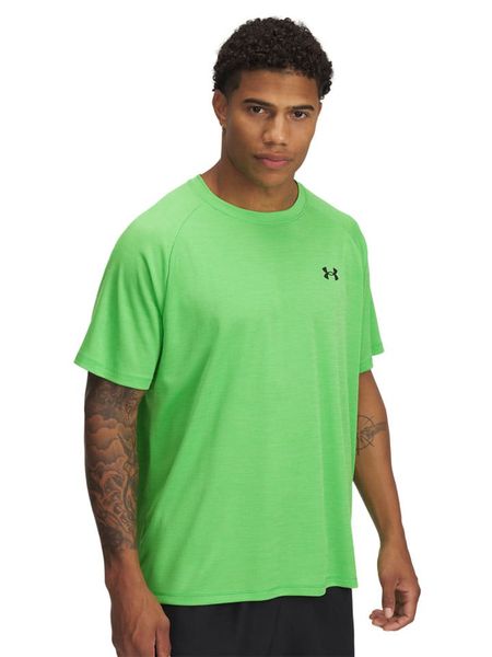 Under Armour Koszulka sportowa "Tech" w kolorze zielonym rozmiar: M. Zielone t-shirty sportowe Under Armour, bez wzorów, z materiału, bez ramiączek, outdoorowe. Za 87.40 zł.