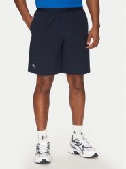 Lacoste Szorty sportowe GH7452 Granatowy Regular Fit. Niebieskie krótkie spodenki sportowe LACOSTE, m, bez wzorów, z syntetyku. Za 229.99 zł.
