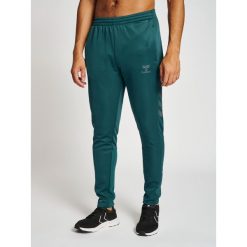 Jogging poliester Hummel Core XK. Zielone szorty Hummel, m, bez wzorów, z materiału, sportowe. Za 199.00 zł.