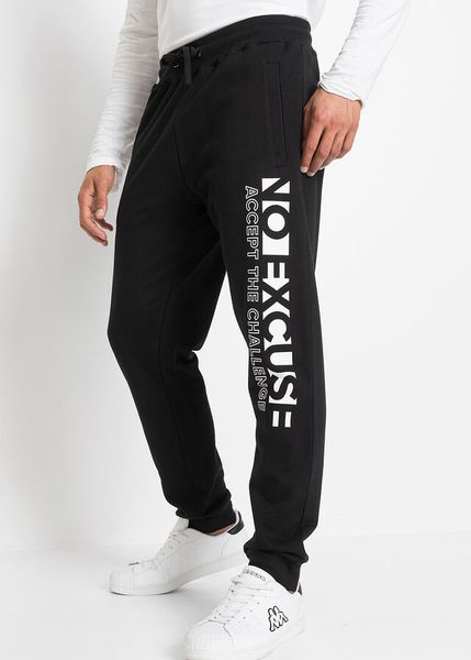 Spodnie ze sportowym nadrukiem uszyte z czystej bawełny. Czarne spodnie treningowe długie bonprix, m, bez wzorów, z bawełny. Za 94.99 zł.