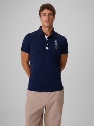 4F Koszulka polo regular męska - granatowa XXL. Niebieskie koszulki polo 4F, m, bez wzorów, z bawełny, bez kołnierzyka, bez ramiączek. Za 129.99 zł.
