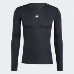 Koszulka TECHFIT Compression Training Long Sleeve. Czarne odzież kompresyjna Adidas, l, bez wzorów, z dzianiny, na fitness i siłownię, techfit (adidas). Za 179.00 zł.