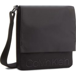 Saszetka CALVIN KLEIN - Shadow Reporter With K50K503913 001. Saszetki i nerki marki CALVIN KLEIN. W wyprzedaży za 239.00 zł.