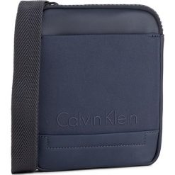 Saszetka CALVIN KLEIN - Caillou Mini Flat Cr K50K502829 422. Saszetki i nerki marki CALVIN KLEIN. W wyprzedaży za 209.00 zł.