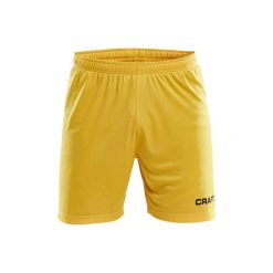 Szorty Craft squad solid. Żółte szorty Craft, bez wzorów, sportowe. Za 145.00 zł.