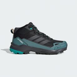 Buty turystyczne Terrex Skychaser AX5 Mid GORE-TEX. Czarne buty turystyczne Adidas, bez wzorów, z gore-texu, bez zapięcia, wspinaczkowe, gore-tex. Za 599.00 zł.