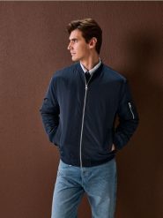 Kurtka bomberka z ociepleniem - granatowy. Niebieskie kurtki Sinsay, l, bez wzorów, bez kaptura. Za 79.99 zł.