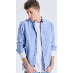 Koszula z nadrukiem all over - Niebieski. Koszule marki Cropp. Za 59.99 zł.