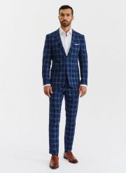 PAKO LORENTE – Granatowe spodnie garniturowe w niebieską kratę. Niebieskie eleganckie spodnie Pako Lorente, bez wzorów, z elastanu. Za 149.99 zł.