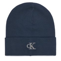 Czapka Calvin Klein. Niebieskie czapki zimowe CALVIN KLEIN, bez wzorów. Za 129.99 zł.