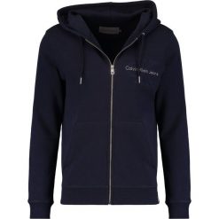 Calvin Klein Jeans HASTO ZIP SLIM FIT Bluza z kapturem blue. Bluzy marki Calvin Klein Jeans. W wyprzedaży za 384.30 zł.