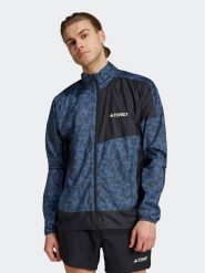 Adidas Wiatrówka Terrex Trail Running Windbreaker HZ5330 Niebieski Regular Fit. Niebieskie kurtki do biegania Adidas, m, bez wzorów, z syntetyku, bez kaptura. Za 309.99 zł.