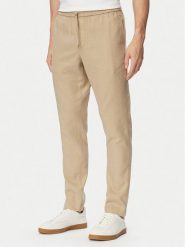 Tommy Hilfiger Chinosy Harlem MW0MW42336 Beżowy Regular Fit. Brązowe eleganckie spodnie Tommy Hilfiger, m, ze lnu. Za 529.99 zł.