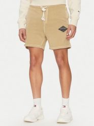 Tommy Jeans Szorty sportowe Varsity DM0DM20936 Beżowy Regular Fit. Brązowe krótkie spodenki sportowe Tommy Jeans, m, bez wzorów, z bawełny. Za 249.99 zł.