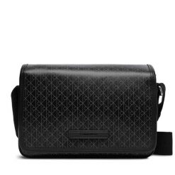 Saszetka Calvin Klein. Czarne saszetki i nerki CALVIN KLEIN, bez wzorów. Za 409.99 zł.