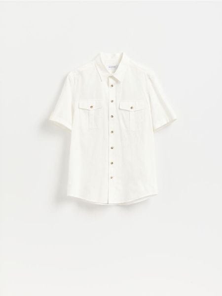 Koszula regular fit - biały. Białe koszule Reserved, l, bez wzorów, z bawełny, bez kołnierzyka, bez ramiączek. Za 139.99 zł.