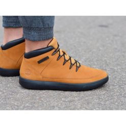 Buty lifestyle męskie Timberland Ashwood Park A2GS9. Żółte buty sportowe casual Timberland, bez wzorów, bez zapięcia. Za 498.80 zł.