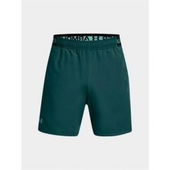 Spodnie treningowe męskie Under Armour 1373718449. Niebieskie buty treningowe Under Armour, bez wzorów, z materiału, na fitness i siłownię. Za 306.00 zł.