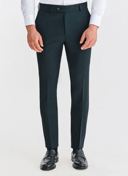 PAKO LORENTE - Wełniane zielone spodnie garniturowe. Zielone garnitury Pako Lorente, do pracy, m, bez wzorów, z wełny. Za 799.99 zł.