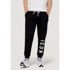 Spodnie Mężczyzna ICON. Czarne spodnie treningowe długie ICON, m, bez wzorów. W wyprzedaży za 278.55 zł.