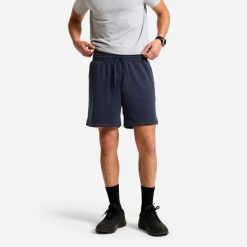 Spodenki sportowe męskie Domyos. Niebieskie krótkie spodenki sportowe DOMYOS, l, bez wzorów, z materiału. Za 34.99 zł.