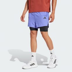 Szorty Gym+ 2-in-1. Czarne szorty Adidas, bez wzorów, z materiału, sportowe. Za 249.00 zł.