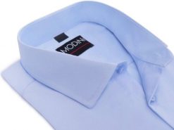 Błękitna/niebieska gładka koszula męska Y72. Niebieskie koszule Modini Moda Męska, m, bez wzorów, z bawełny, bez kołnierzyka, bez ramiączek. W wyprzedaży za 169.20 zł.