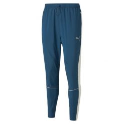 Puma Spodnie Run Tapered 52085865. Niebieskie szorty Puma, m, bez wzorów, z dresówki. W wyprzedaży za 227.30 zł.