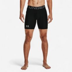 Spodenki męskie Under Armour HeatGear® kompresyjne. Czarne krótkie spodenki sportowe Under Armour, l, bez wzorów, z materiału. Za 119.99 zł.