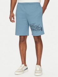 Lacoste Szorty sportowe GH0286 Niebieski Regular Fit. Niebieskie krótkie spodenki sportowe LACOSTE, m, bez wzorów, z bawełny. Za 289.99 zł.