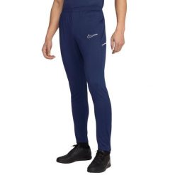 Spodnie męskie Nike Dri-FIT Academy 25 - granatowe. Niebieskie spodnie treningowe długie Nike, m, bez wzorów, z poliesteru. Za 141.99 zł.