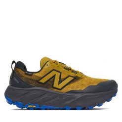 Buty do biegania New Balance. Żółte buty do biegania New Balance, bez wzorów, z gore-texu, bez zapięcia, do biegania, gore-tex. Za 799.99 zł.