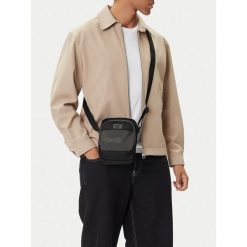 Saszetka Reebok. Czarne saszetki i nerki Reebok, bez wzorów, małe, bez dodatków. Za 69.99 zł.