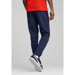 Męskie spodnie Portugalia Casuals PUMA Persian Blue Sunny Yellow. Niebieskie spodnie materiałowe Puma, l, bez wzorów, z dresówki, eleganckie. Za 269.00 zł.