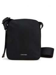 Calvin Klein Saszetka Ck Ease Reporter S K50K512886 Czarny. Czarne saszetki i nerki CALVIN KLEIN, bez wzorów, z materiału. Za 239.99 zł.