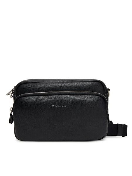Calvin Klein Saszetka Raised Camera Bag LV04D3159G Czarny. Czarne saszetki i nerki CALVIN KLEIN, bez wzorów, ze skóry. Za 299.99 zł.