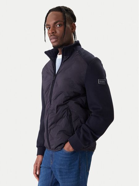 Guess Kurtka przejściowa M6RL10 WJ232 Granatowy Regular Fit. Niebieskie kurtki Guess, m, z aplikacjami, z syntetyku, bez kaptura. Za 794.99 zł.