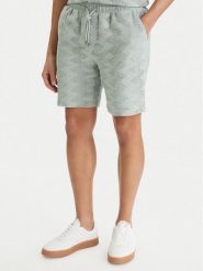 Guess Szorty materiałowe M6GD29 K3237 Zielony Regular Fit. Zielone szorty Guess, m, z aplikacjami, z bawełny. Za 379.99 zł.