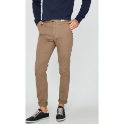 Tommy Hilfiger - Spodnie Denton Chino Org Str Twill. Szare eleganckie spodnie Tommy Hilfiger, na co dzień, bez wzorów, z bawełny, casualowe. W wyprzedaży za 459.90 zł.