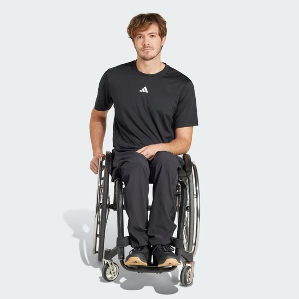 Spodnie Adaptive. Czarne buty treningowe Adidas, bez wzorów, z materiału, na fitness i siłownię. W wyprzedaży za 263.20 zł.