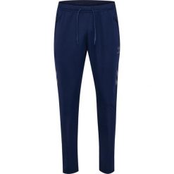 Spodnie treningowe Hummel Cima 2.0. Niebieskie szorty Hummel, bez wzorów, sportowe. Za 212.50 zł.