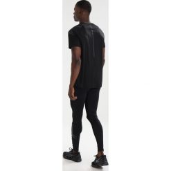 ASICS ICON Legginsy performance black/dark grey. Spodnie treningowe długie ASICS, z elastanu. Za 229.00 zł.