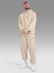 4F Spodnie dresowe joggery męskie 4F x Tomasz Fornal - beżowe L. Brązowe joggery i bojówki 4F, l, z aplikacjami, z dresówki. Za 189.99 zł.